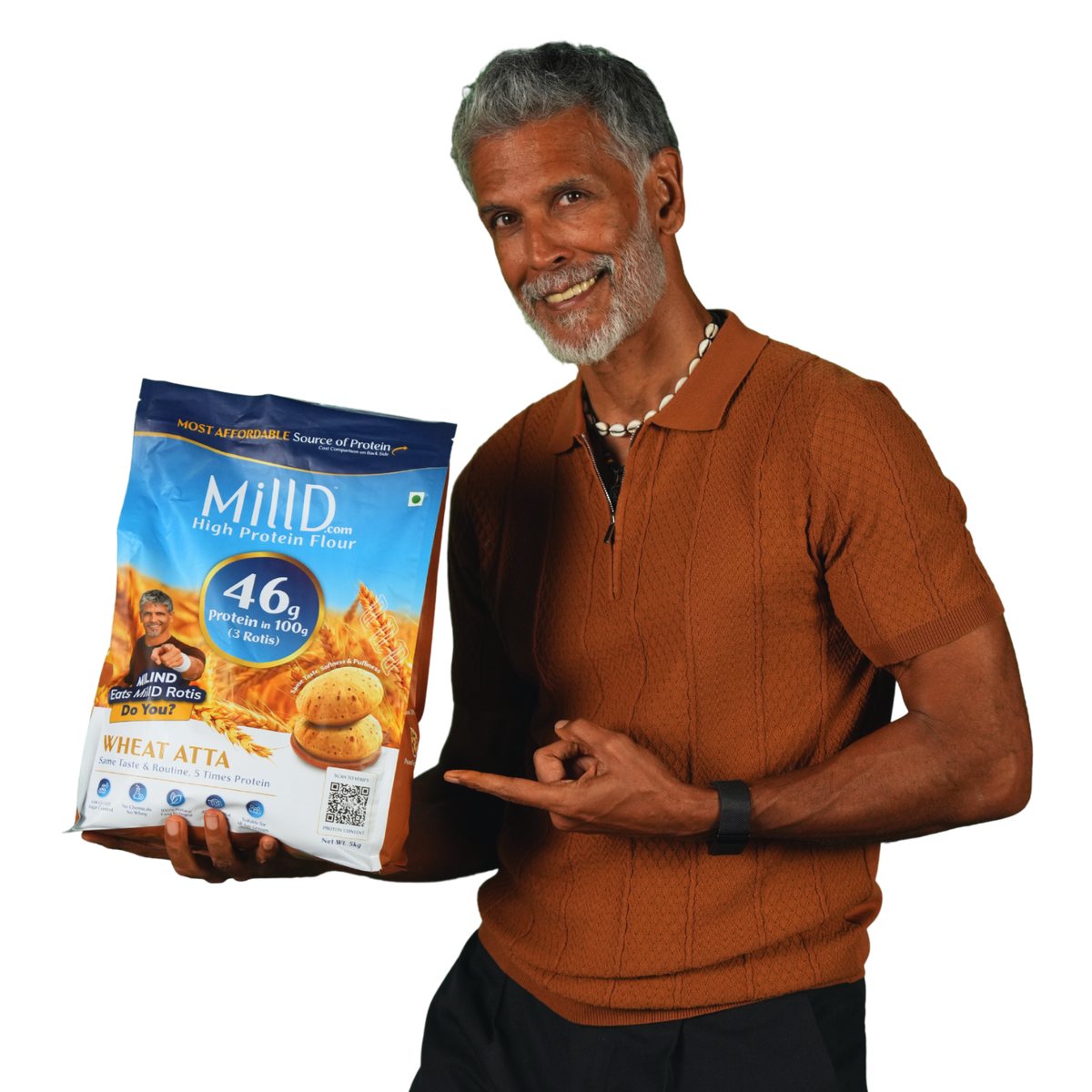 Milind Soman holding MillD High Protein Atta