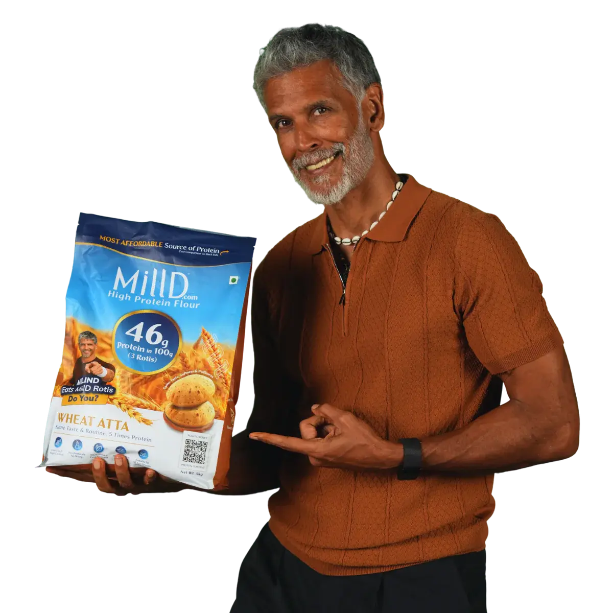 Milind Soman holding MillD High Protein Atta with 46g protein per 100g 